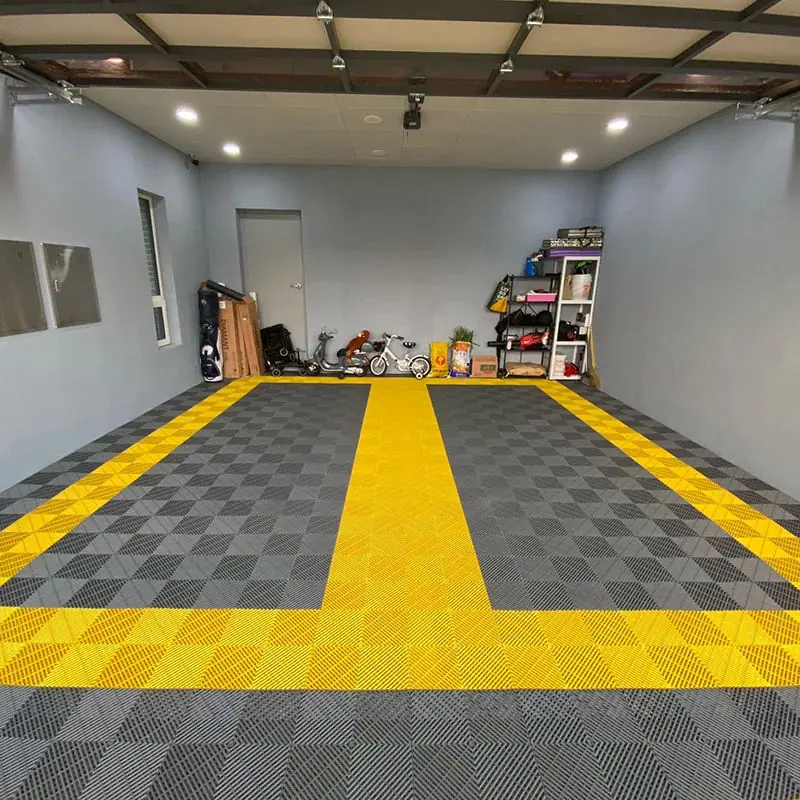Gray and yellow checkered interlocking garage floor tiles