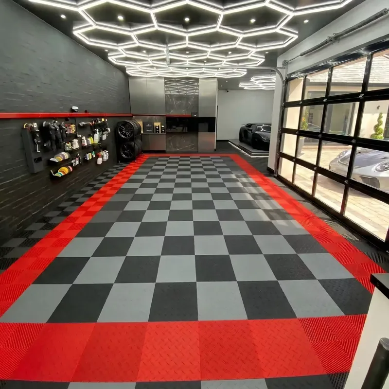 Garage Flooring Tiles 68 Black and gray checkered garage flooring with red border, modern lighting, and luxury car.