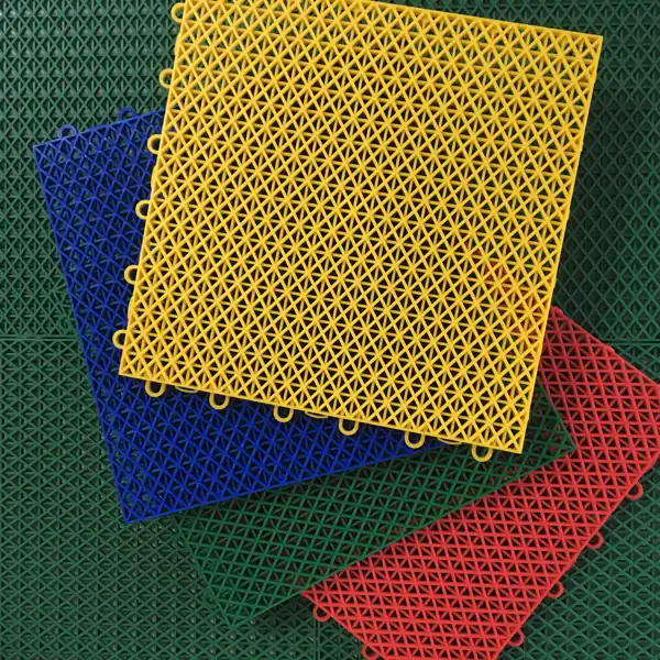 Garage Flooring Tiles 8 Interlocking garage flooring tiles in red, blue, yellow, and green.